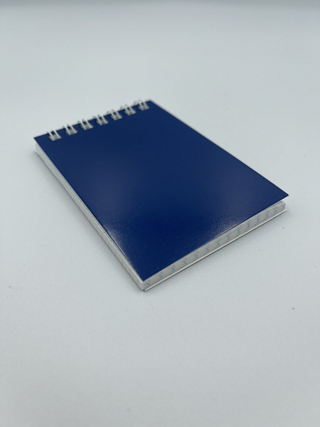 Блокнот А7 (68 х 99 мм) 32л.кл.на гребне Синяя,обл.дизайнерский картон,блок офсет